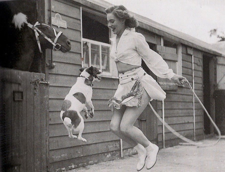 Woman and Dog Jumping Rope, ca. 1940s