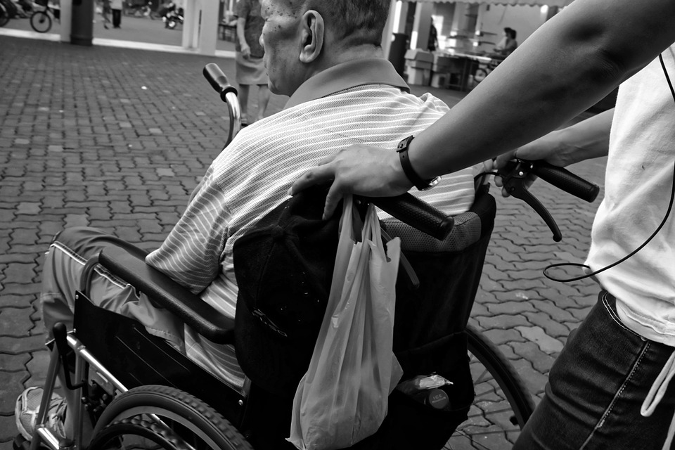 sad man wheelchair