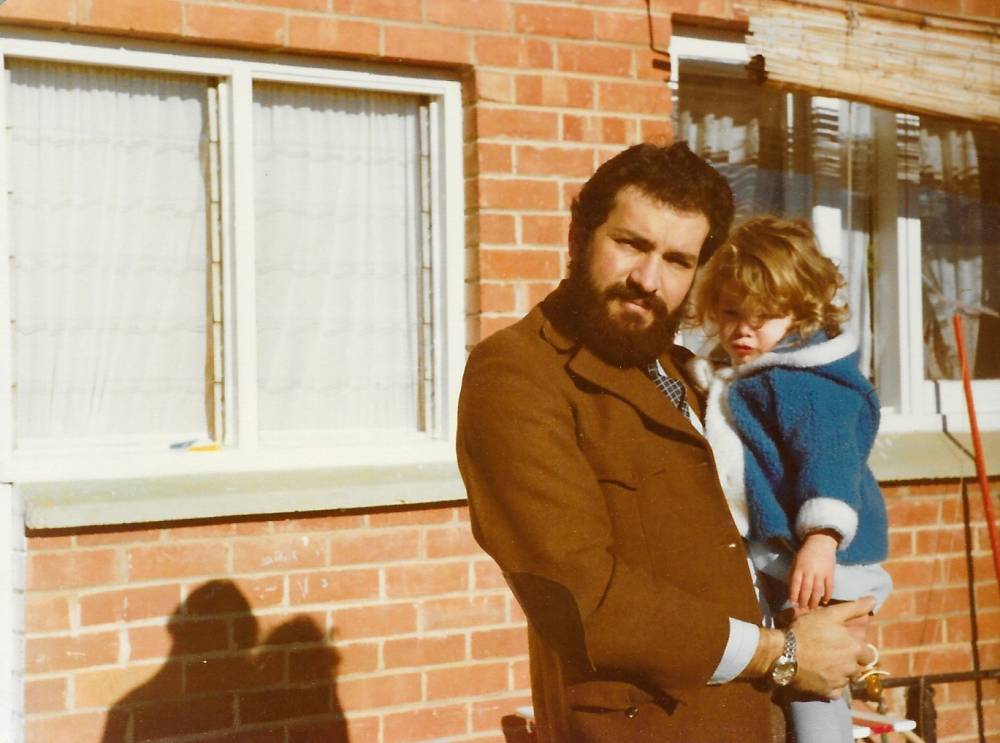 Rebecca, aged three, with her father. Supplied.