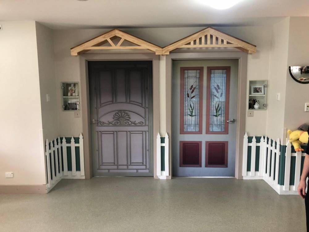 Vintage Doors Turn Secure Dementia Unit Into A Community Village