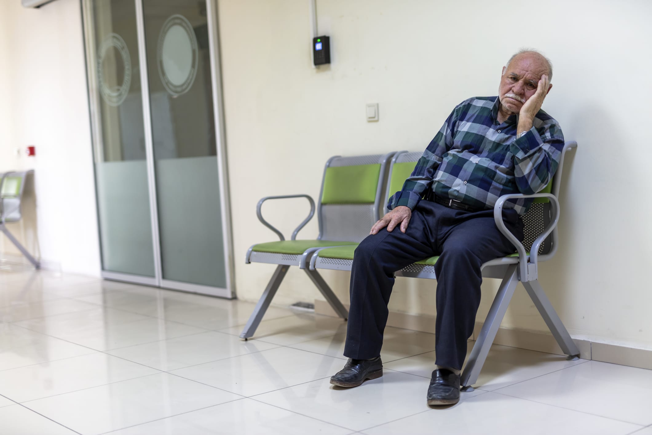 Patient sitting  in a waiting room