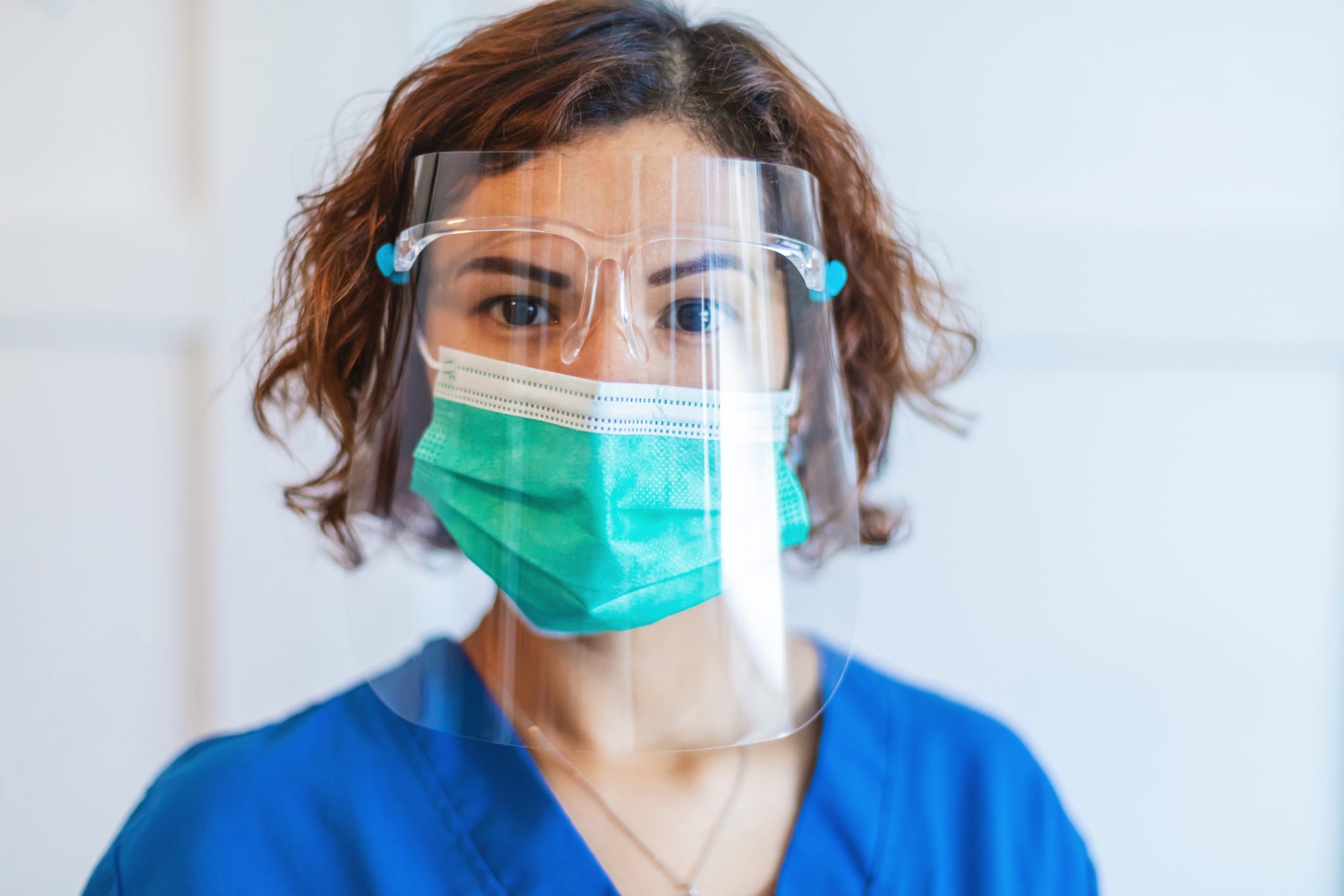 Female Nurse Wearing Protective Face-mask and Face Shield Photo Series