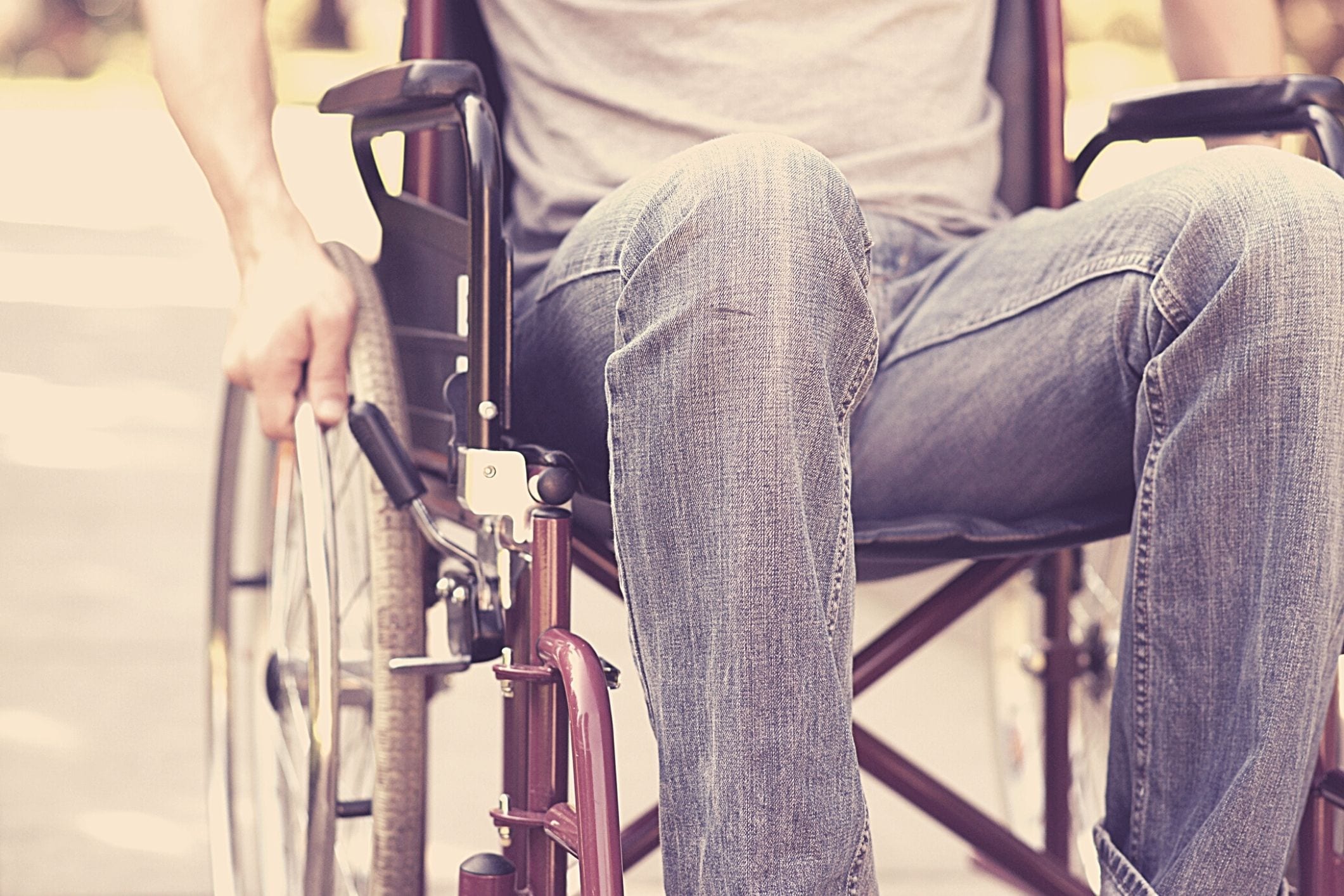 Young man wheelchair aged care
