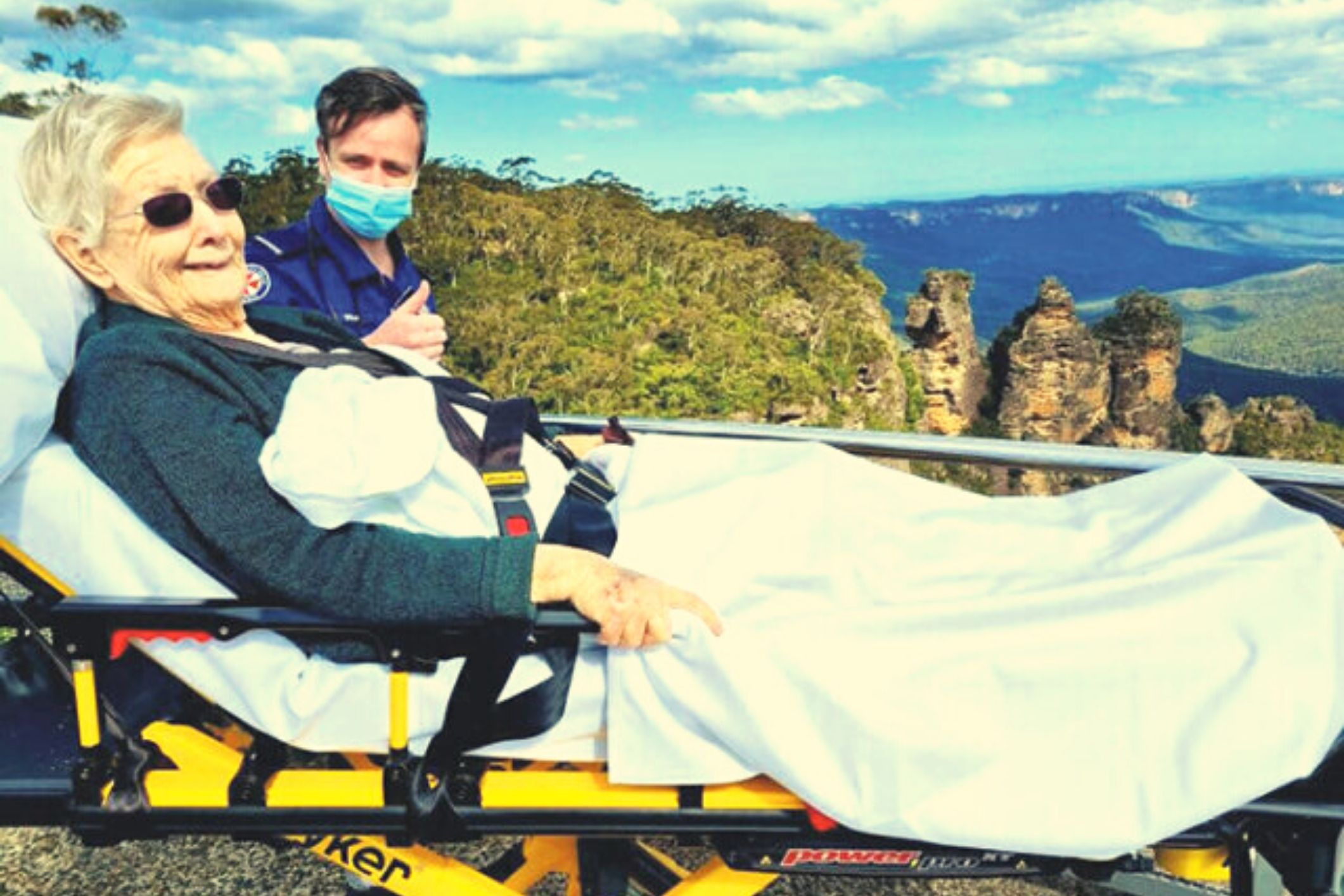 Paramedics surprise palliative patient with a trip to Three Sisters mountain range