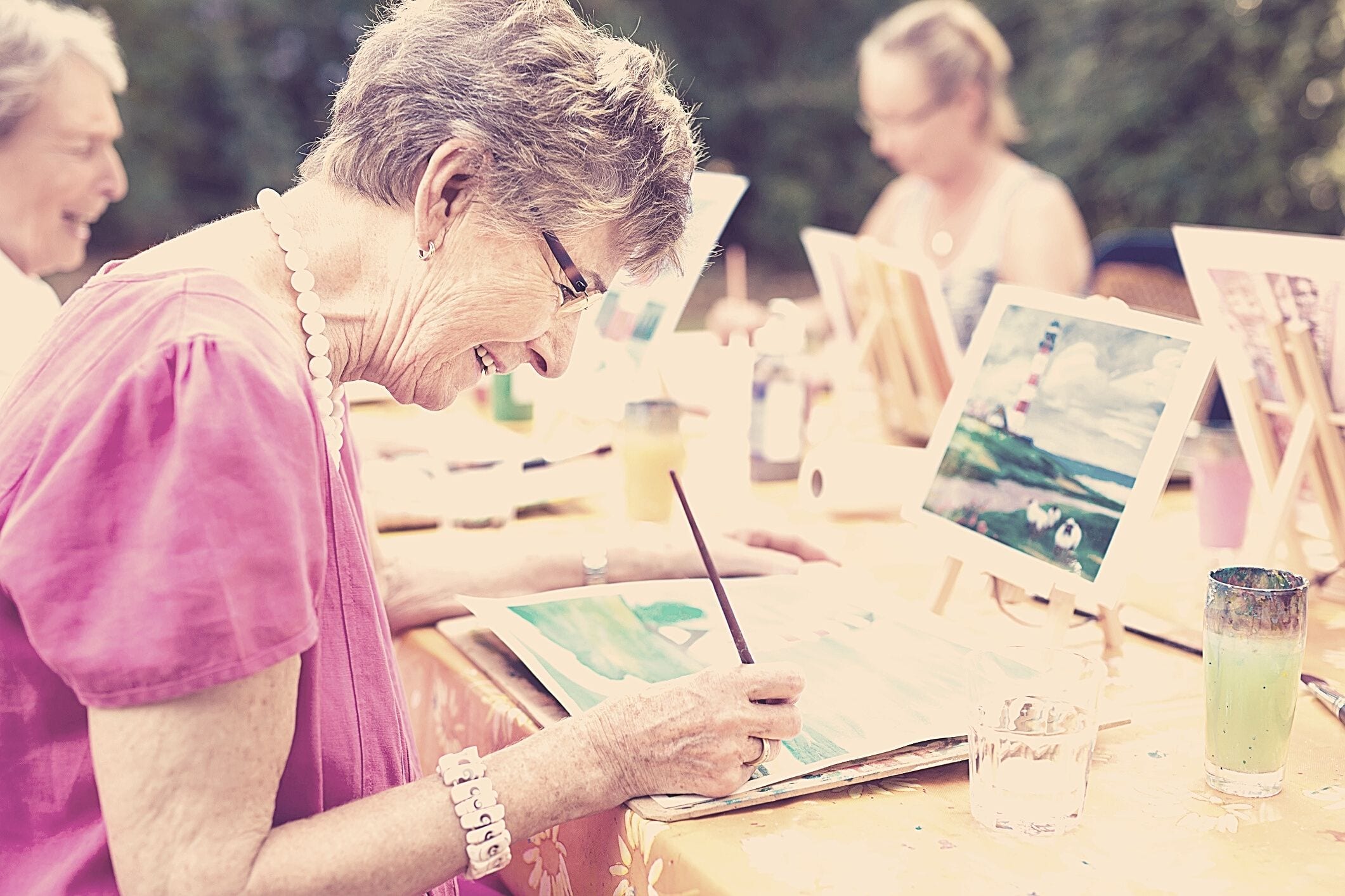 Senior woman painting