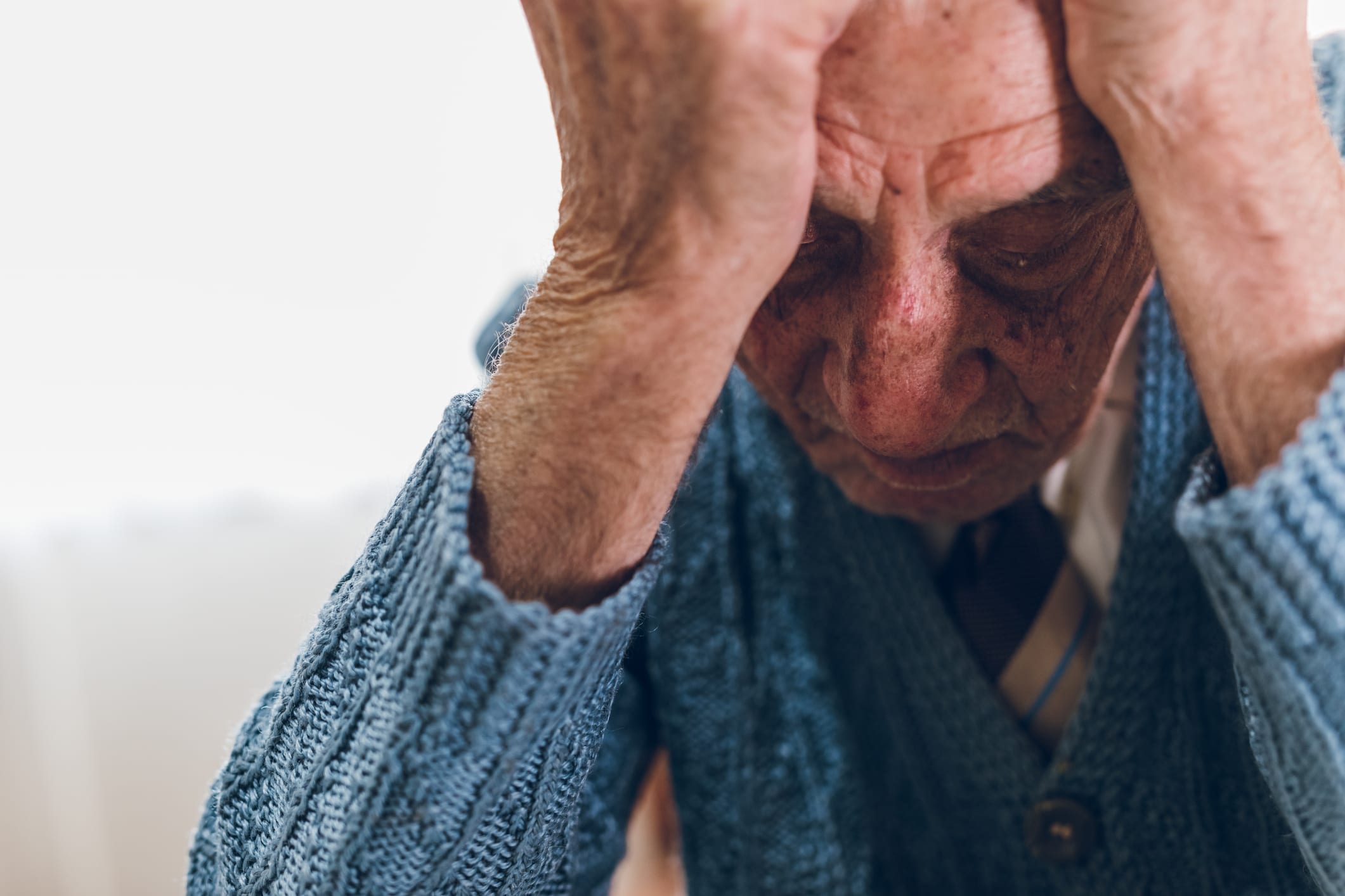 Sad senior man thinking about life