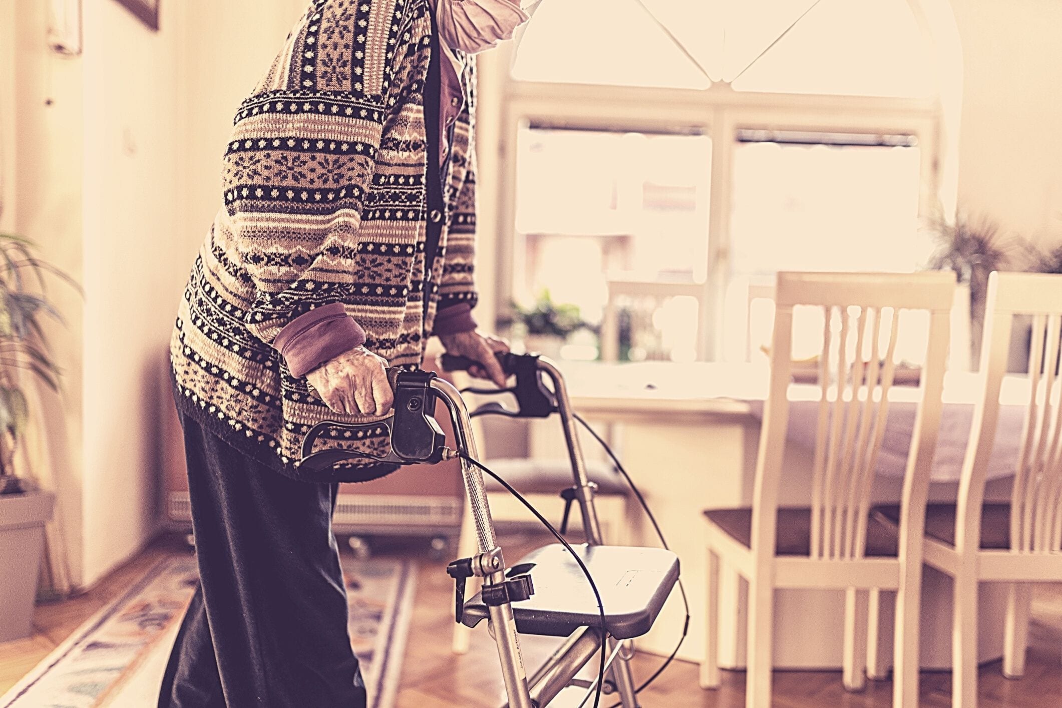 Elderly lady walker aged care home
