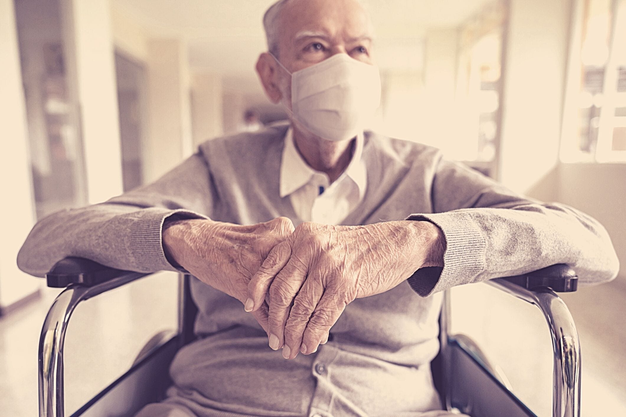 Aged care senior man mask wheelchair