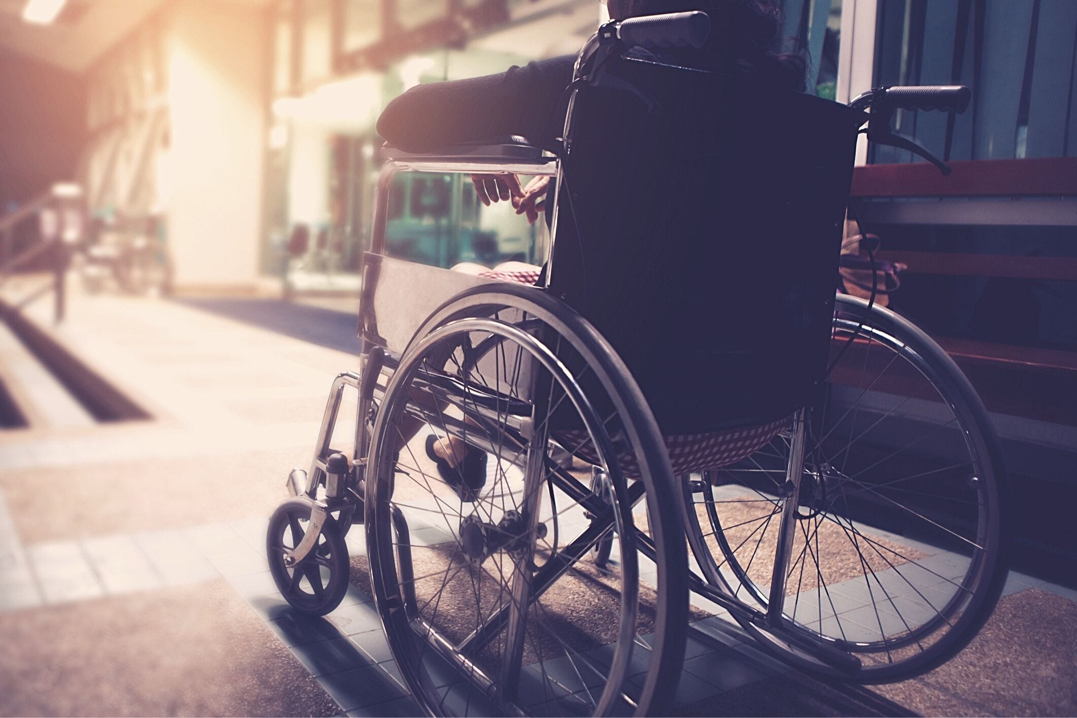Elderly woman in wheelchair