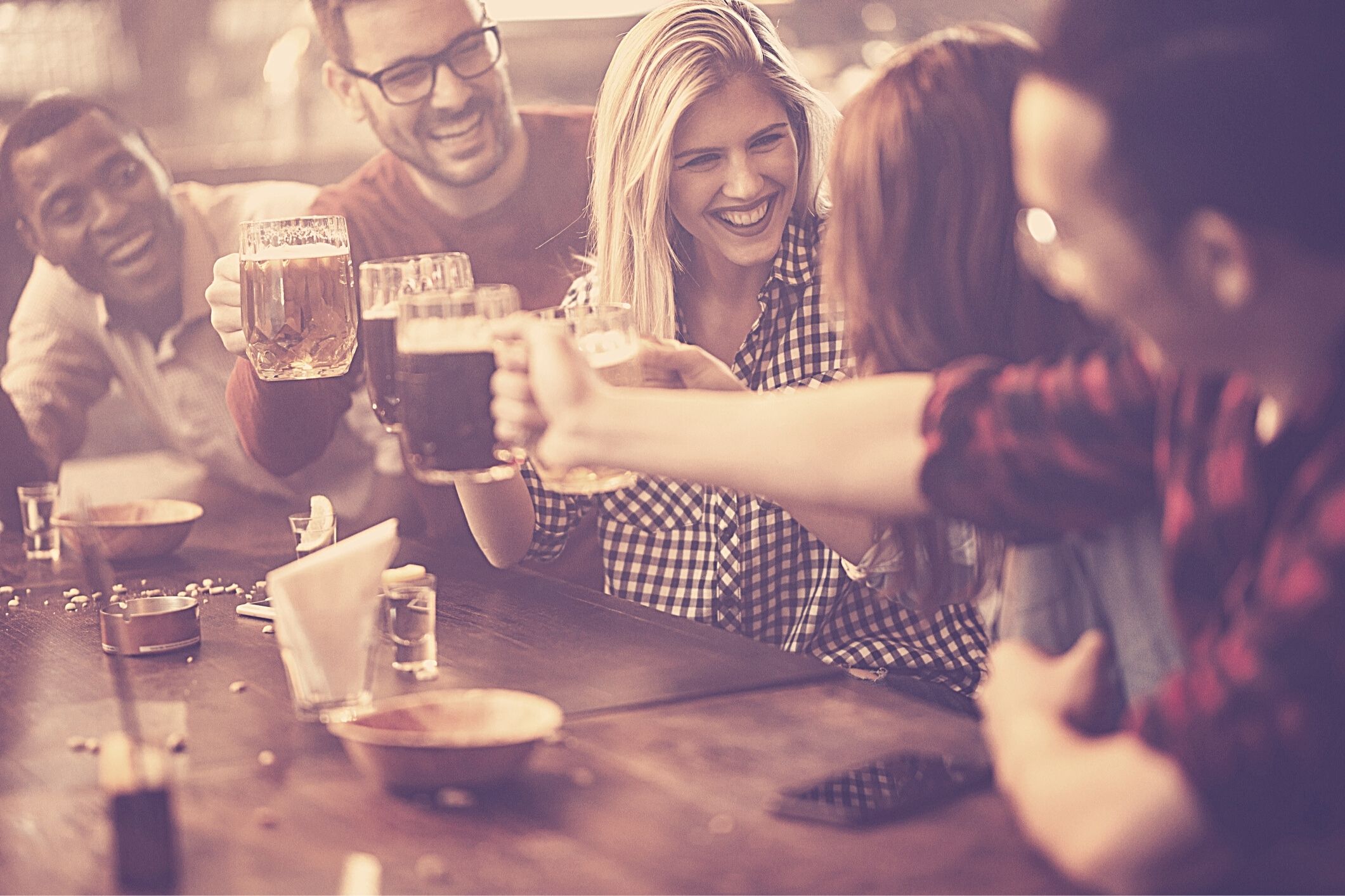 Friends socialising at bar