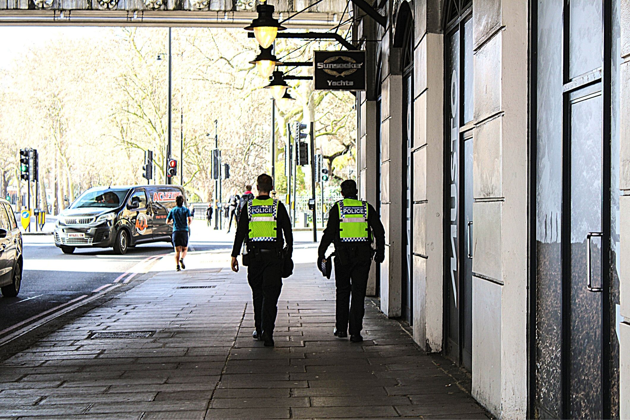 Police walking down street