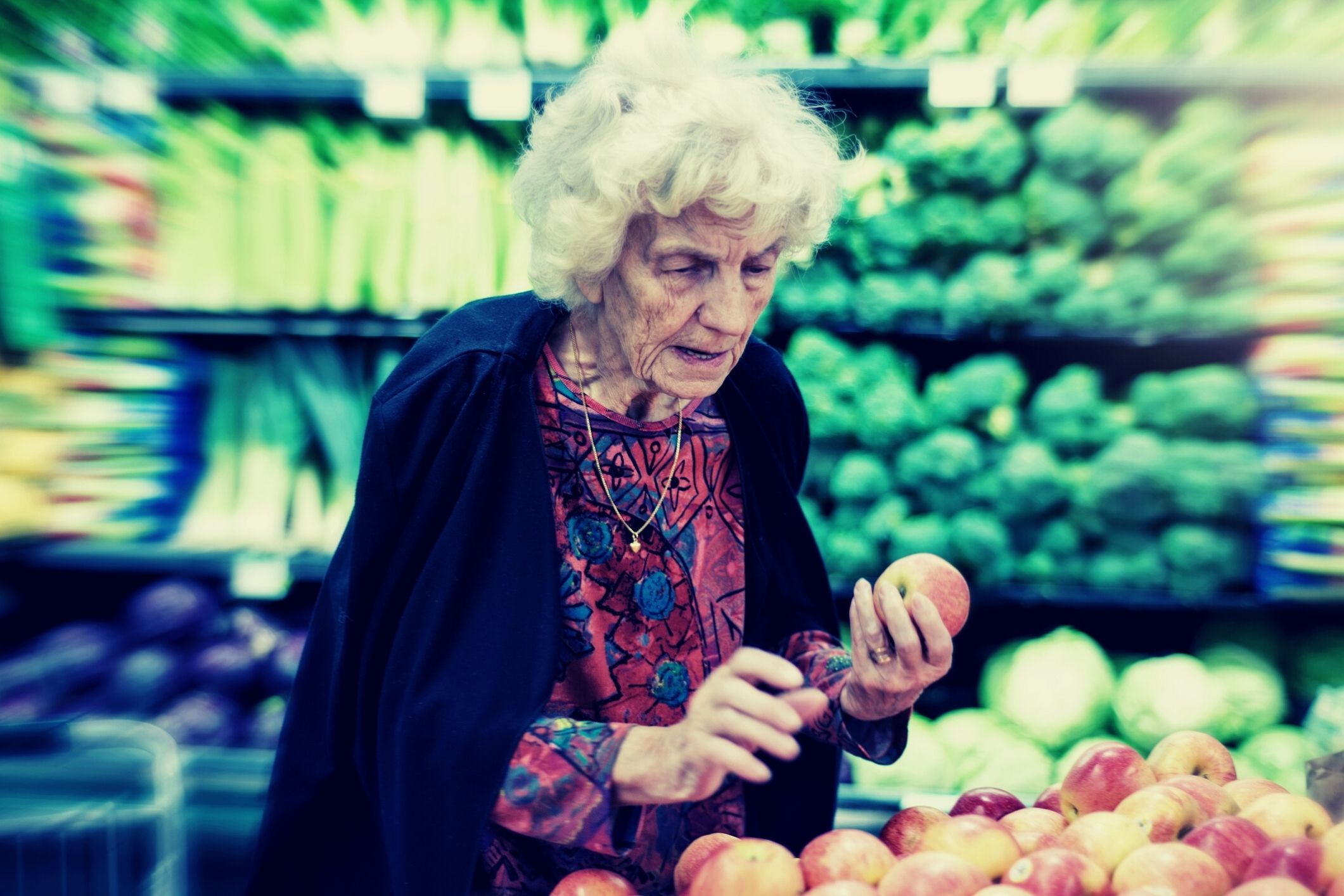 Elderly woman shopping and confused