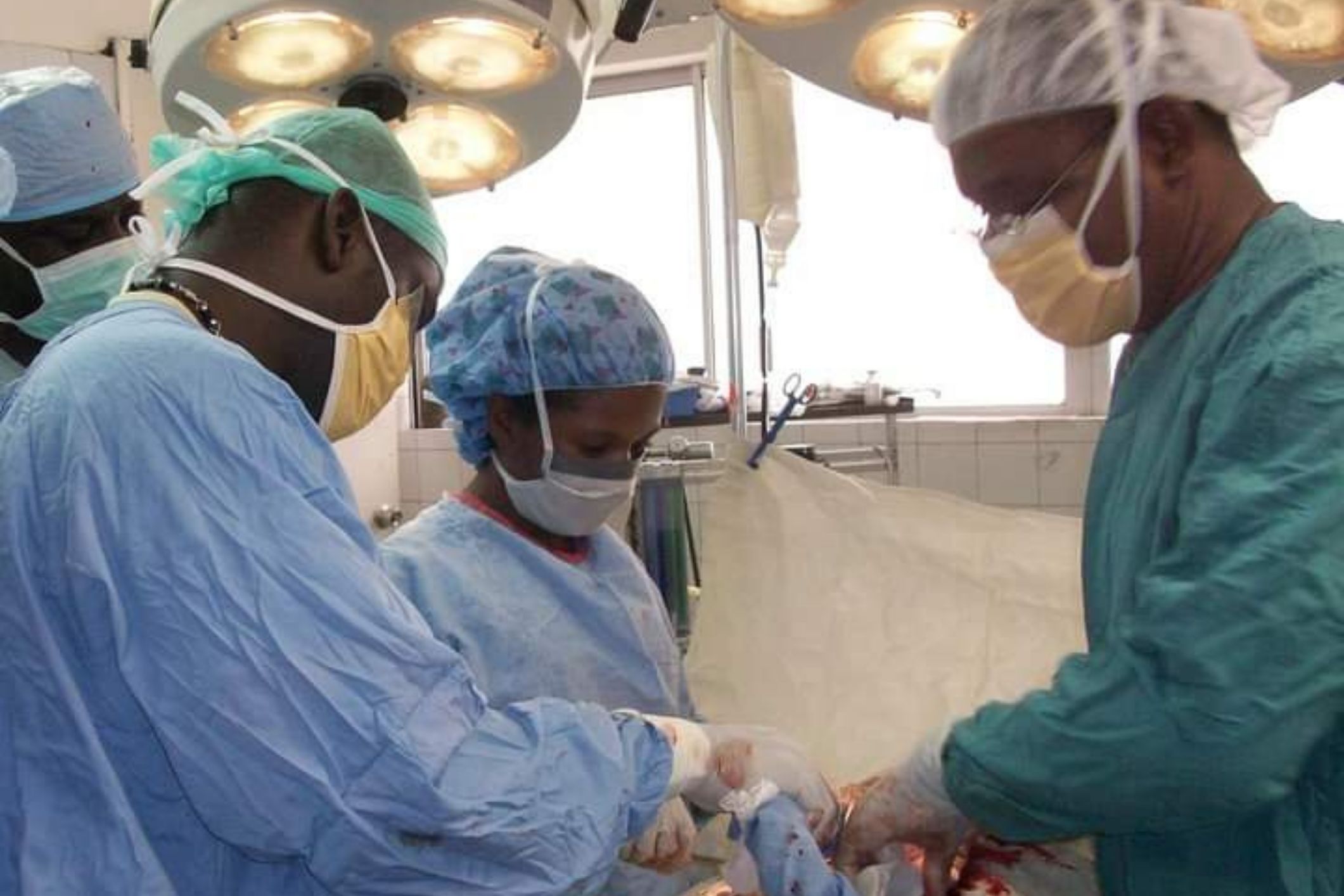 Guy-Robert performing surgery