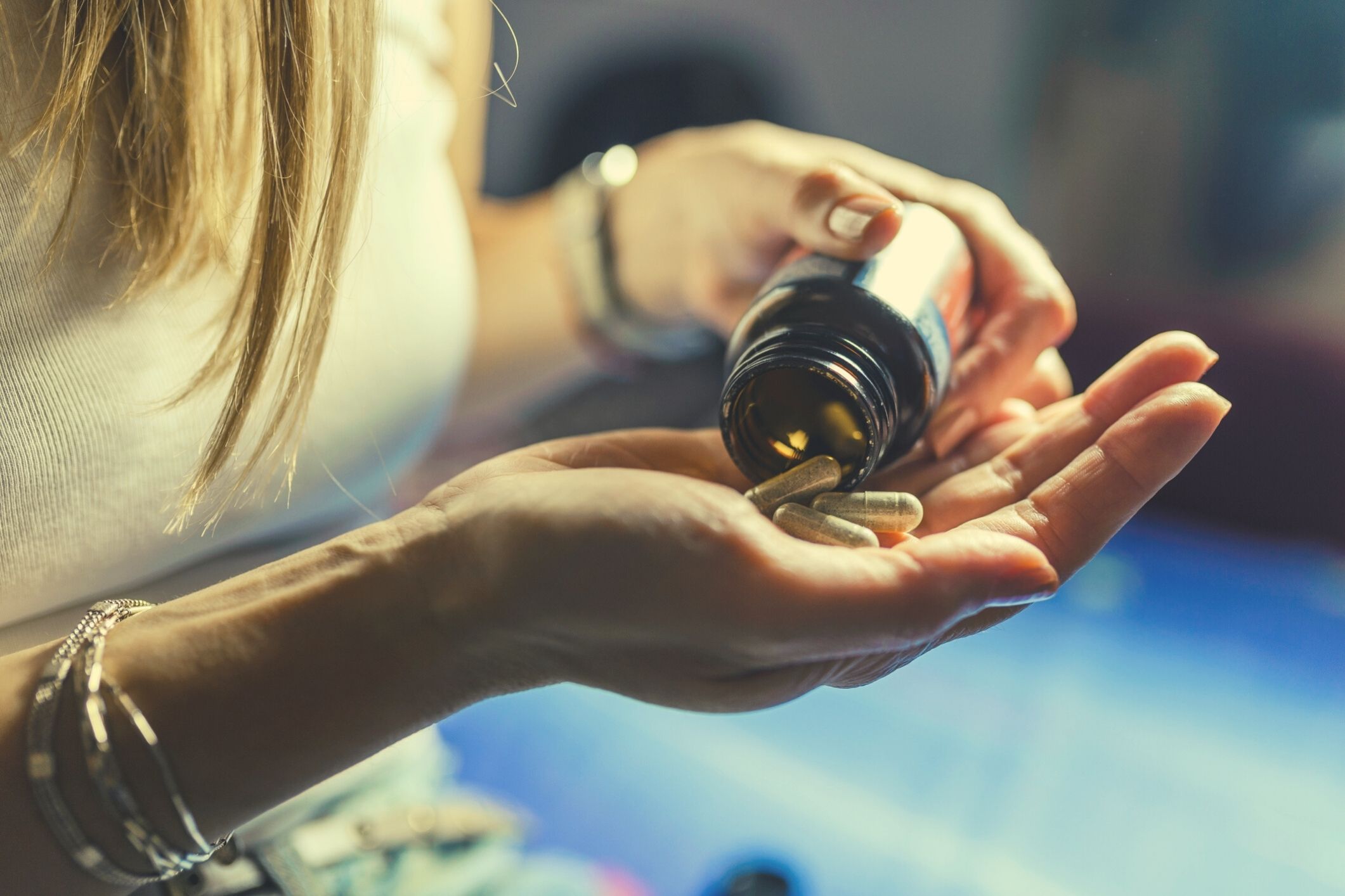 Woman taking vitamins