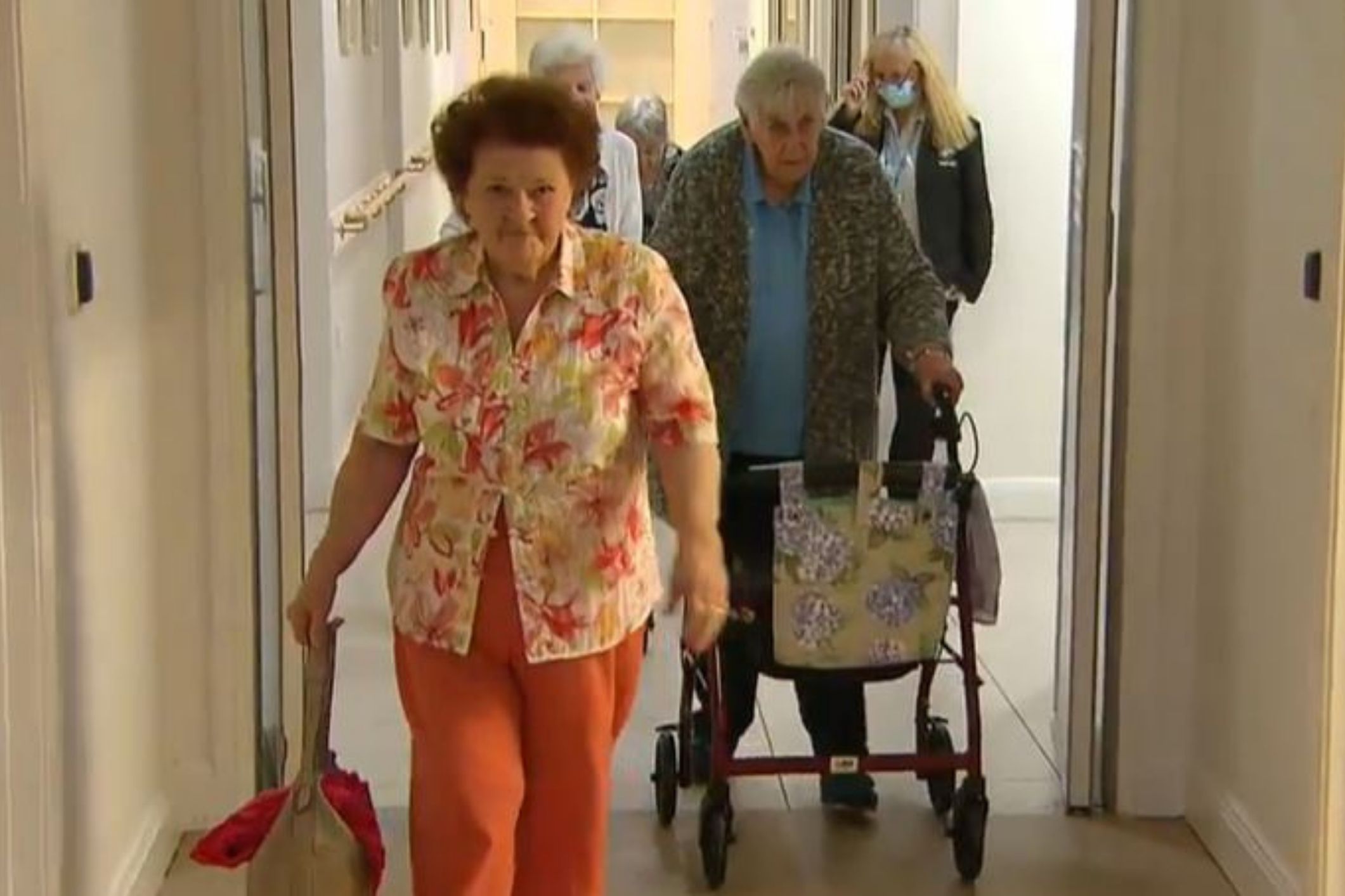 unsuspecting residents make their way into the lounge area