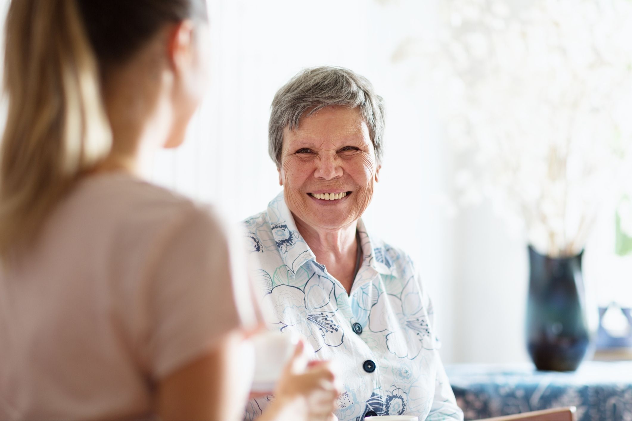 Senior woman and aged care worker
