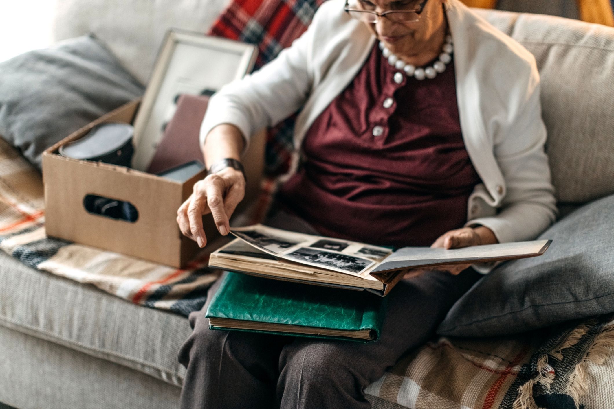 Woman looking at photo album