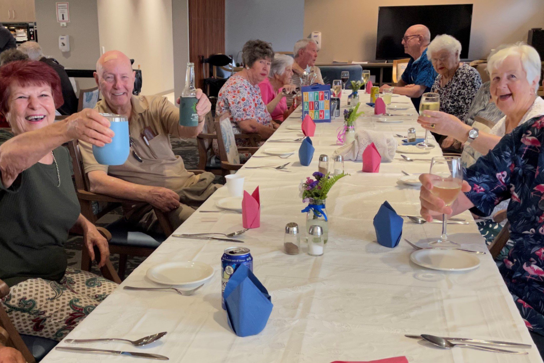 Residents raise a toast over a Sunday roast