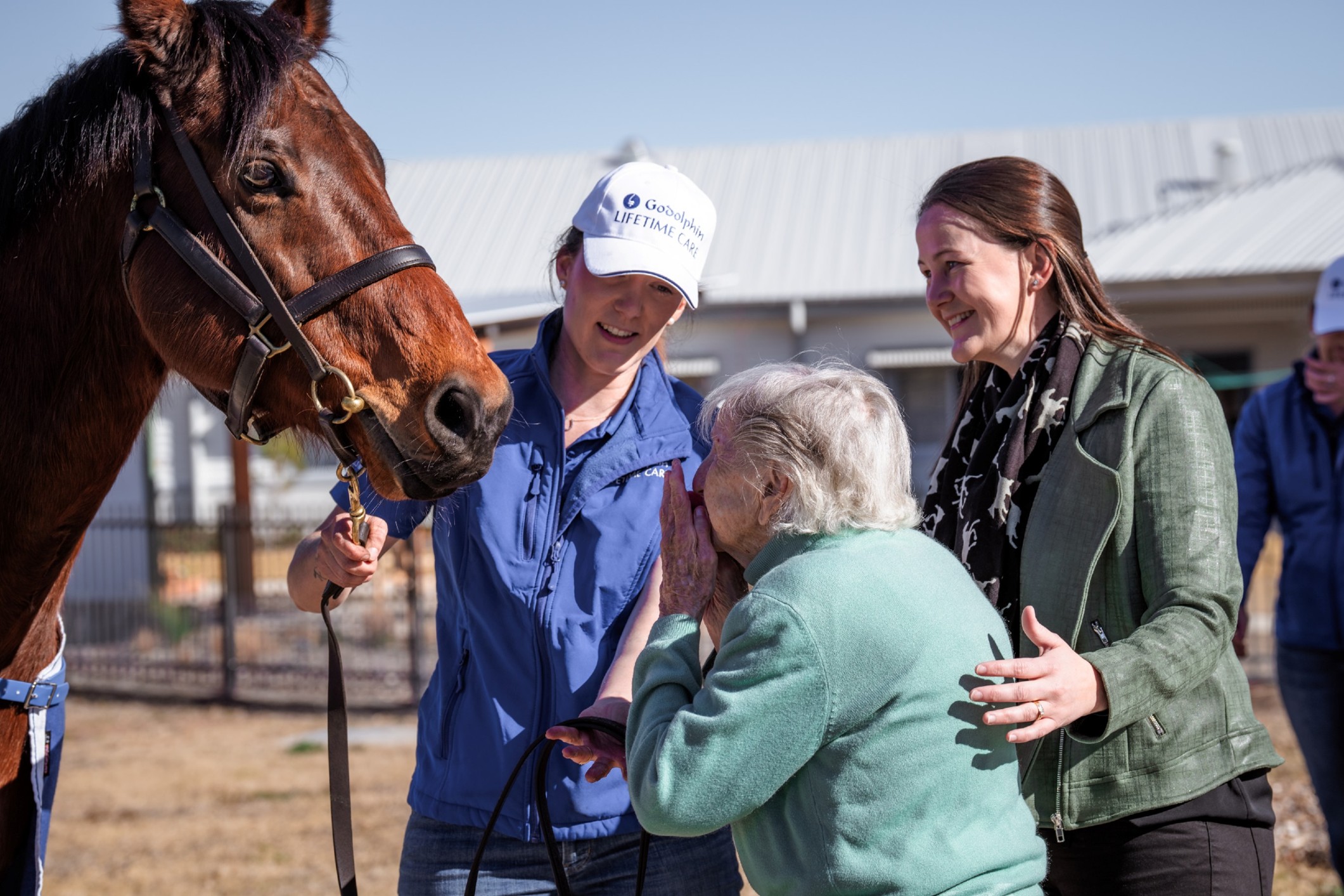 Ozzie with resident Helen Vincent, Caitlyn Easey and Lori McKern (1mb)